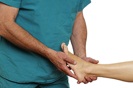 podiatrist with patient examining foot pain